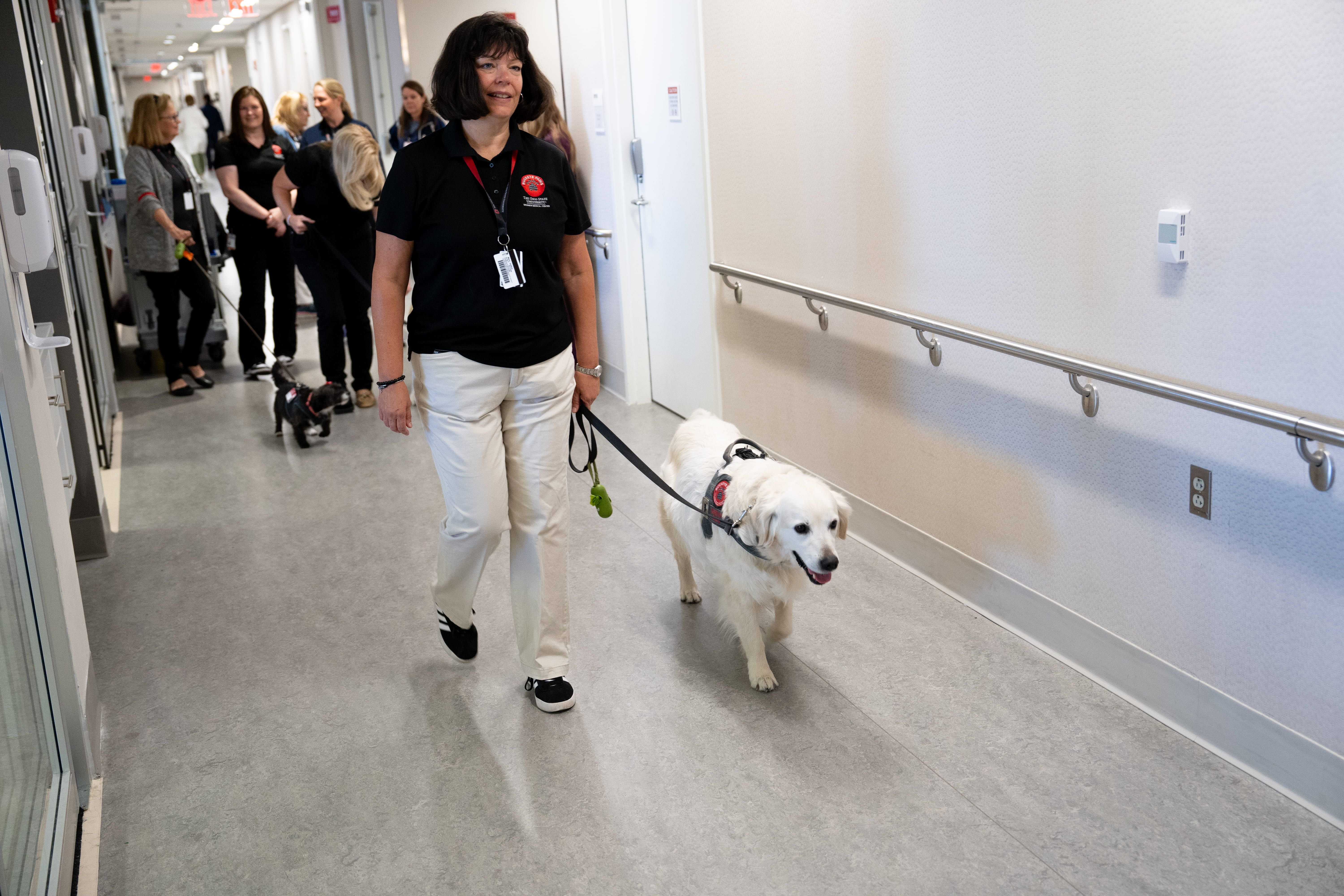 Buckeye Paws visit -- Mary Justice and Shiloh.jpg